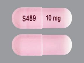 s489 pink capsule|v 10 pill pink and white.